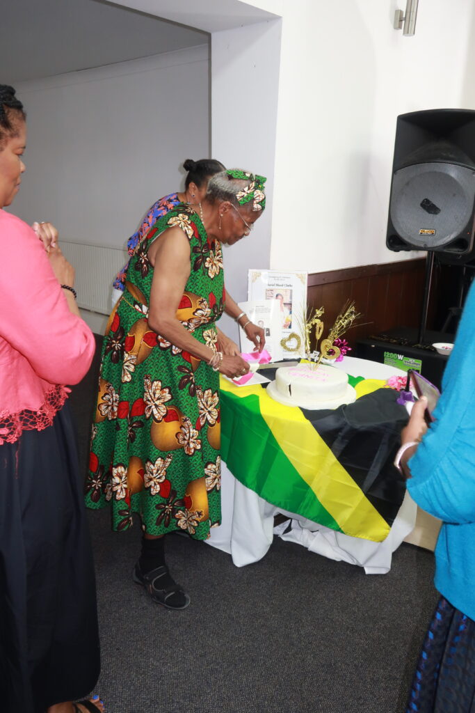 Vernita cutting the Birthday cake