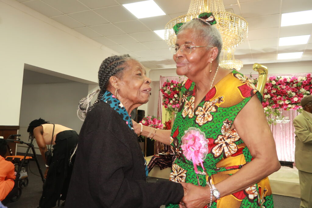 Vernita and Pat sharing a moment